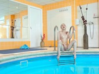 Elle Rose : Sexy brunette swims in indoor pool when dude joins her : sex scene #2